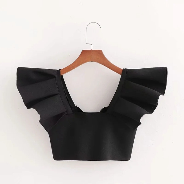 Lühike mustade lokkidega rinnakas