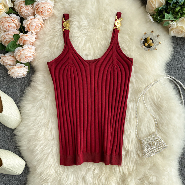 Sieviešu trikotāžas tops ar metāla elementu