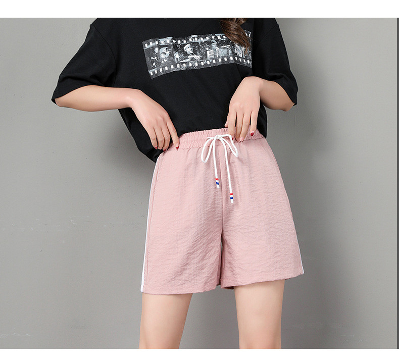 Naiste taskutega spordipüksid