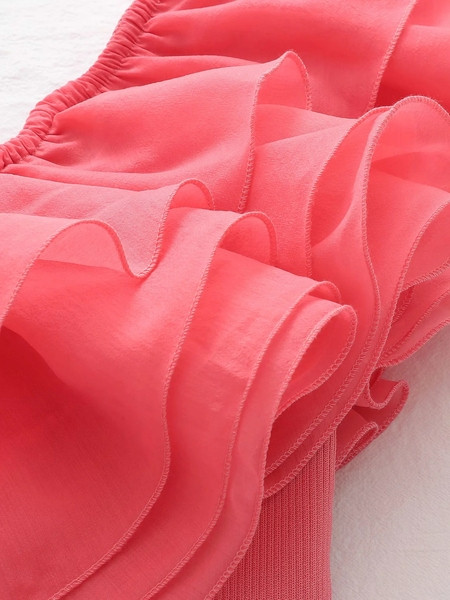 Lühike ühe rihma ja lokkidega rinnakas