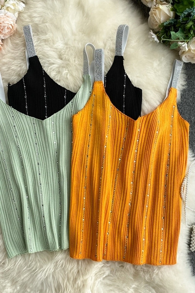 Sieviešu bikses ar V veida kakla izgriezumu un akmeņiem