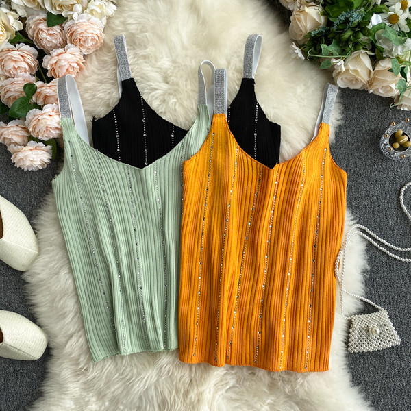 Sieviešu bikses ar V veida kakla izgriezumu un akmeņiem