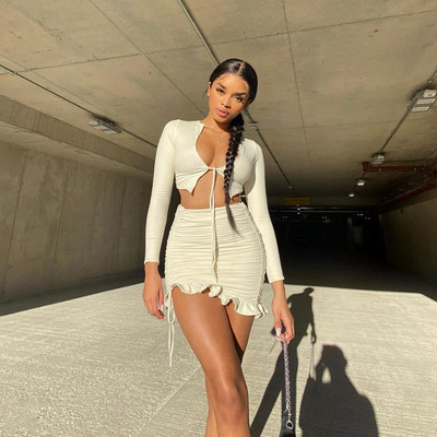 Modern női szett kétrészes felső + szoknya nyakkendővel