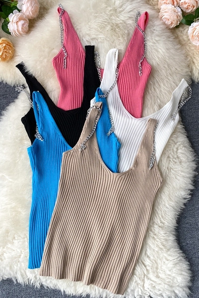 Naiste topp ümara kaelusega ja metallketiga