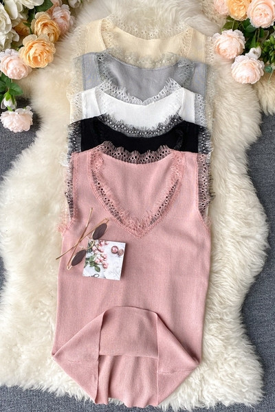 Sieviešu ikdienišķa bikses ar smailu kakla izgriezumu un mežģīnēm