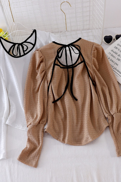 Női ing nyakkendővel és ovális nyakkivágással, fekete, barna és fehér színekben