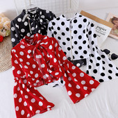 Mitmes värvitoonis paela ja lootosevarrukaga naiste särk