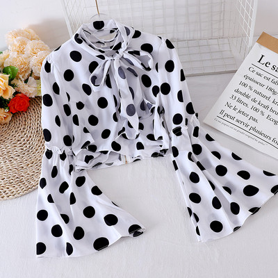 Mitmes värvitoonis paela ja lootosevarrukaga naiste särk