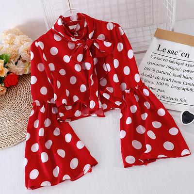 Mitmes värvitoonis paela ja lootosevarrukaga naiste särk