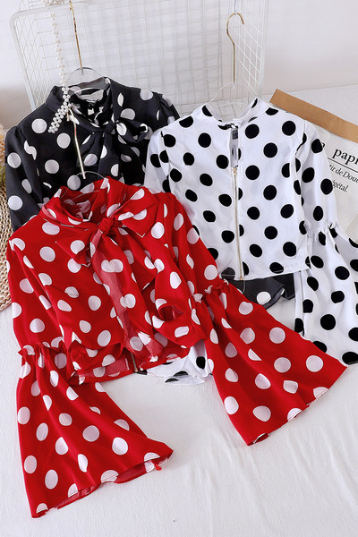 Mitmes värvitoonis paela ja lootosevarrukaga naiste särk