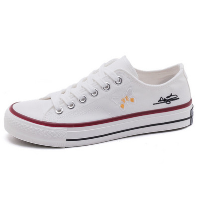 Alkalmi női tornacipő hímzéssel és nyakkendővel