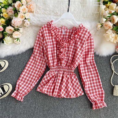 Naiste ruuduline särk elastse vöökoha ja pikkade varrukatega