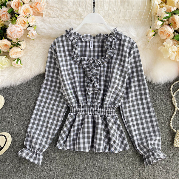 Naiste ruuduline särk elastse vöökoha ja pikkade varrukatega