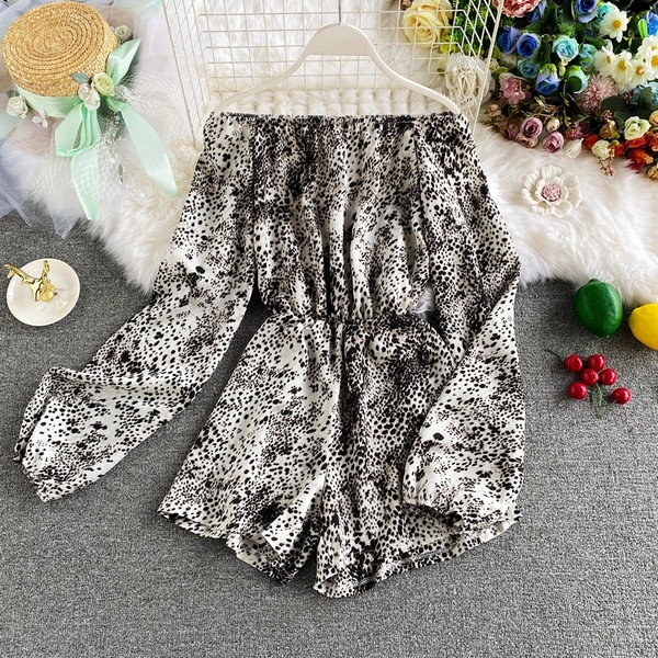 Sieviešu ikdienas kombinezons ar atkailinātiem pleciem un elastīgu jostasvietu