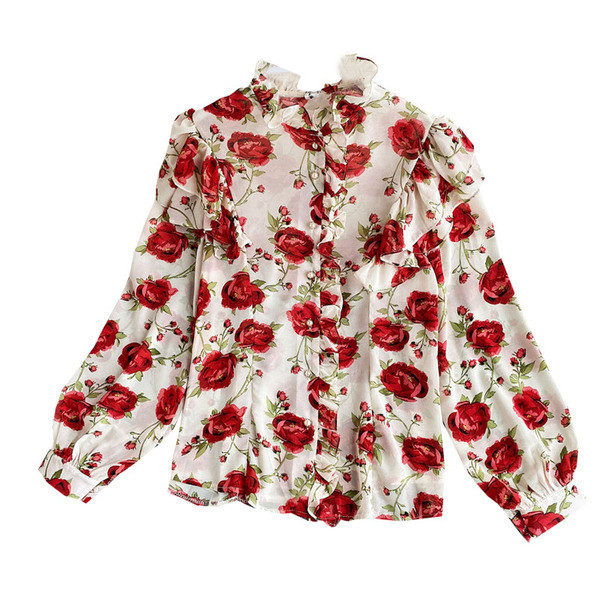 Lillemustri ja pikkade varrukatega naiste moodne särk