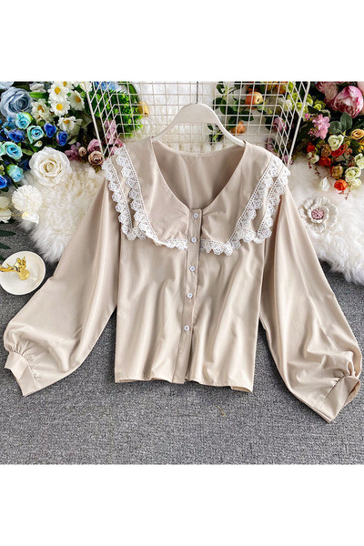 Mitmes värvitoonis nööpide ja spits-kaelusega naiste vabaajasärk