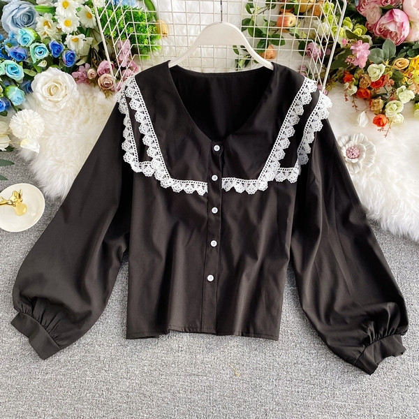 Mitmes värvitoonis nööpide ja spits-kaelusega naiste vabaajasärk