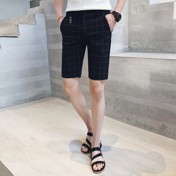 Pantaloni moderni in carouri cu buzunare