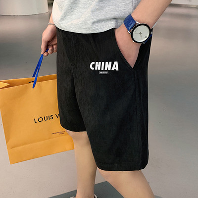 Térdig érő alkalmi nadrág és felirat