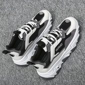 Alkalmi férfi tornacipő fekete-fehér színben, fűzővel