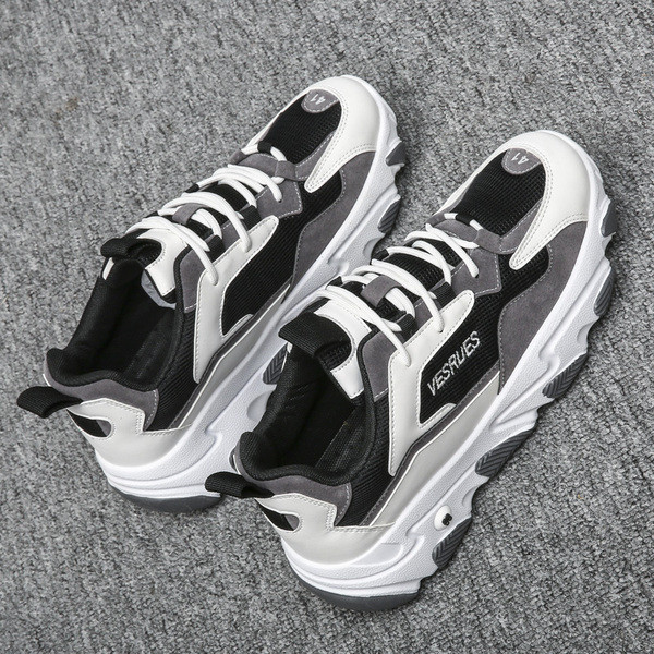 Alkalmi férfi tornacipő fekete-fehér színben, fűzővel