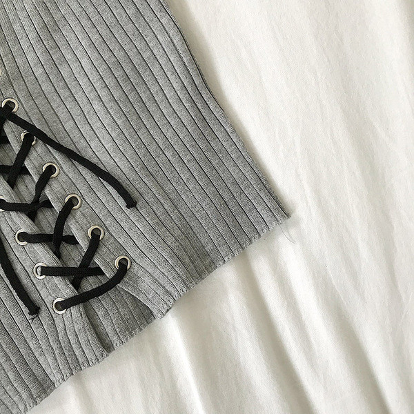 Jauna modeļa sieviešu topiņš ar plānām lencītēm un saitēm