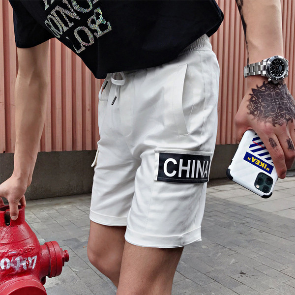 Taskutega meeste lühikesed püksid