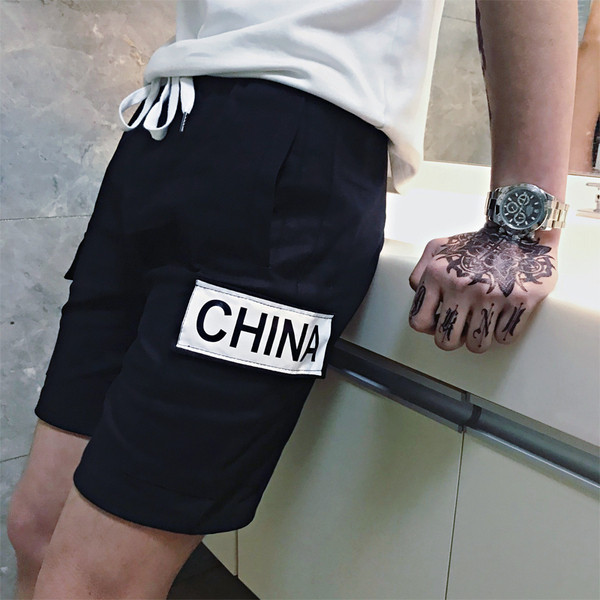 Taskutega meeste lühikesed püksid