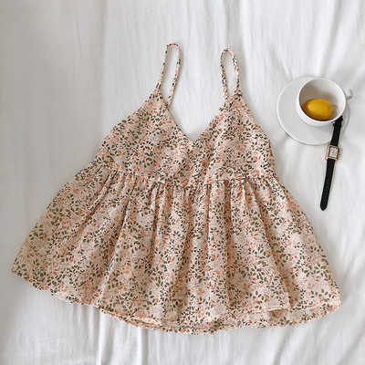 Uut mudelit peenikeste rihmade ja lillemotiividega naiste topp