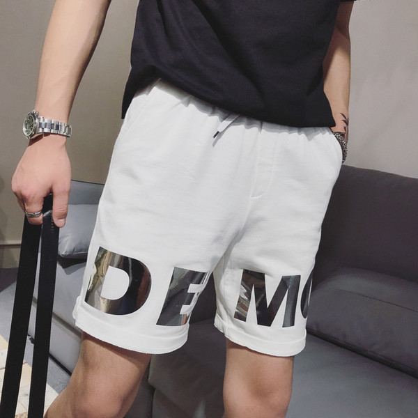 Sporta un ikdienas bikses ar spīdīgu apdruku