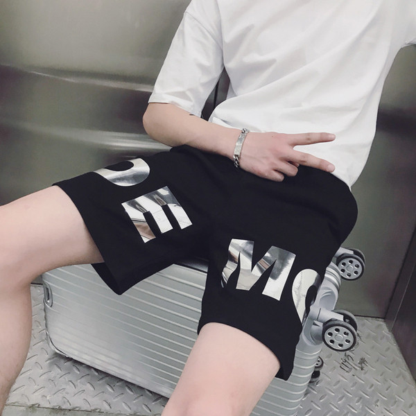 Sporta un ikdienas bikses ar spīdīgu apdruku