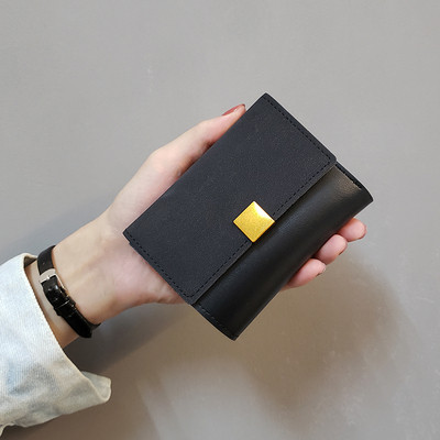 Kisméretű női pénztárca, eco bőrből készült fém rögzítéssel