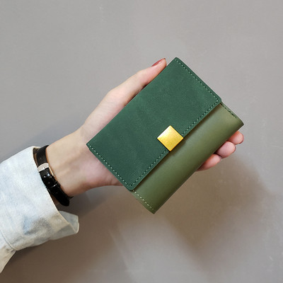 Kisméretű női pénztárca, eco bőrből készült fém rögzítéssel