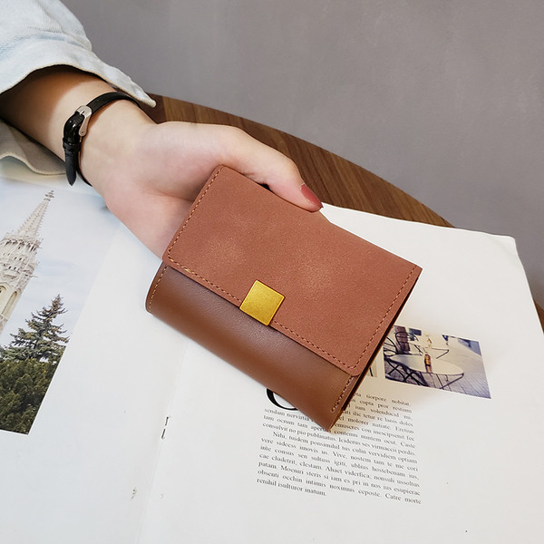 Kisméretű női pénztárca, eco bőrből készült fém rögzítéssel