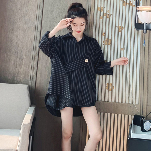 Stilīgs sieviešu asimetrisks krekls ar garām piedurknēm baltā un melnā krāsā