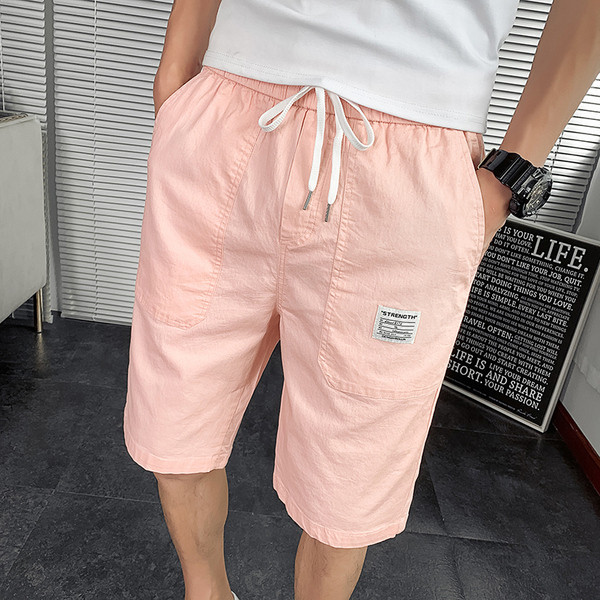 Põlveni ulatuvad vabaaja püksid ja elastne vöökoht