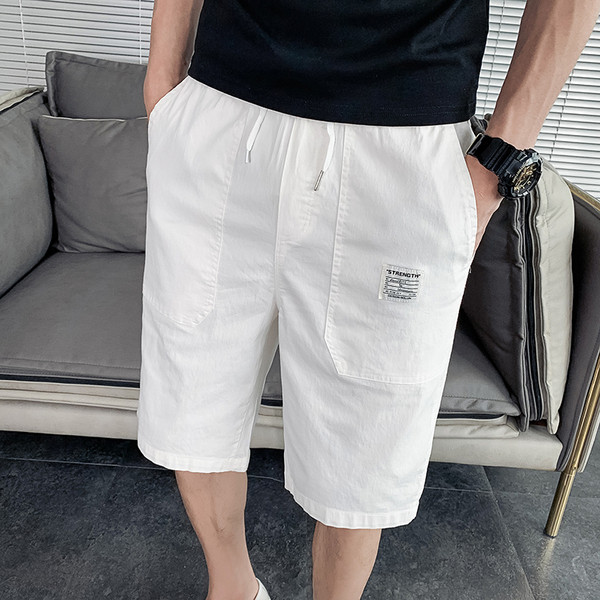 Põlveni ulatuvad vabaaja püksid ja elastne vöökoht