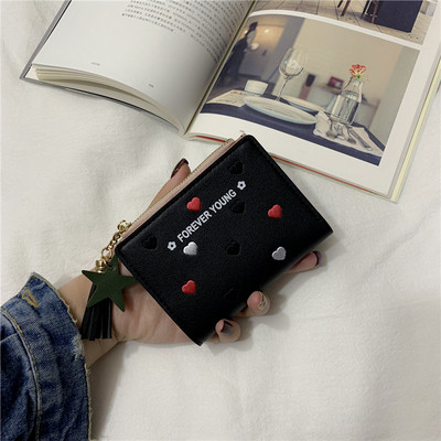 Mazs sieviešu maciņš no eko ādas ar rāvējslēdzēju un aksesuāru