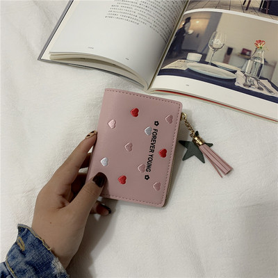 Mazs sieviešu maciņš no eko ādas ar rāvējslēdzēju un aksesuāru