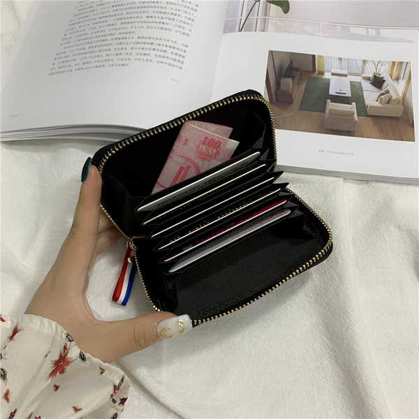 Kisméretű női pénztárca eco bőr cipzárral