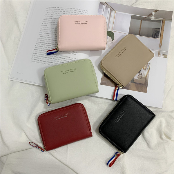 Kisméretű női pénztárca eco bőr cipzárral