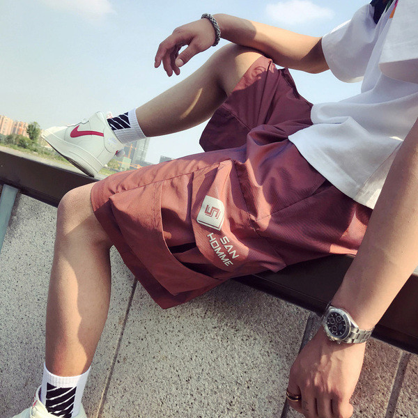 Pantaloni de vara cu buzunare laterale - model lat