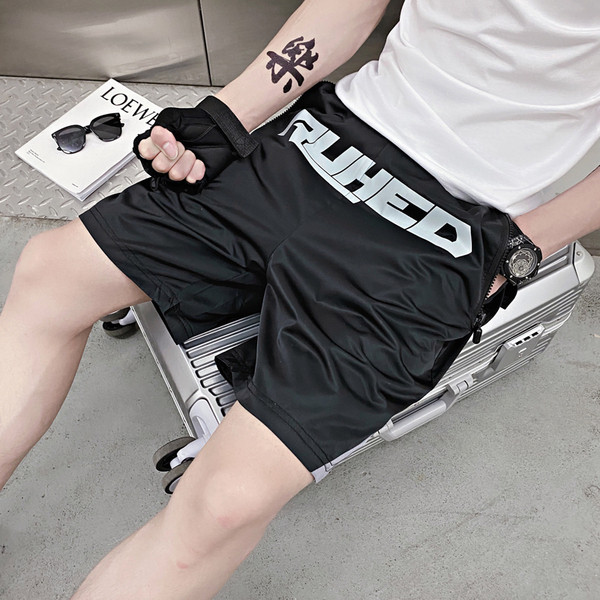 Férfi 3/4-es fekete színű, feliratos nadrág