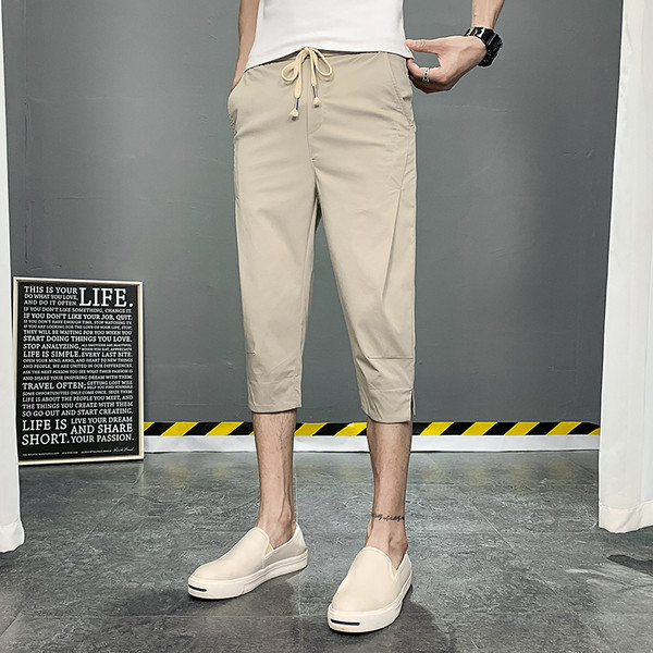 Meeste püksid pikkusega 7/8 ja paeltega