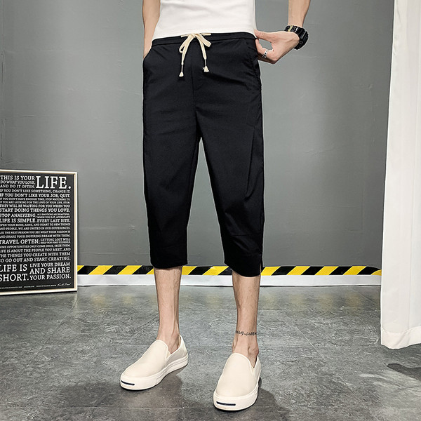 Meeste püksid pikkusega 7/8 ja paeltega