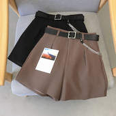 Moodsad naiste lühikesed püksid vöö ja metallelemendiga