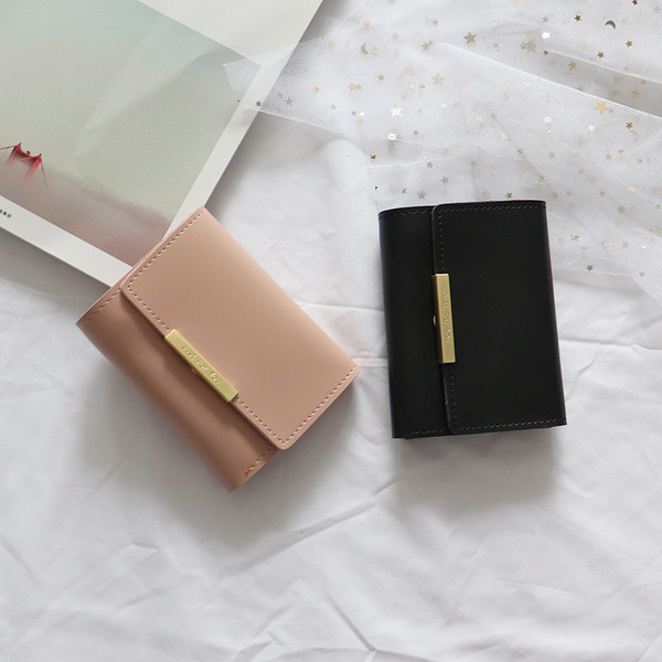 Bőr kis női pénztárca fém rögzítéssel