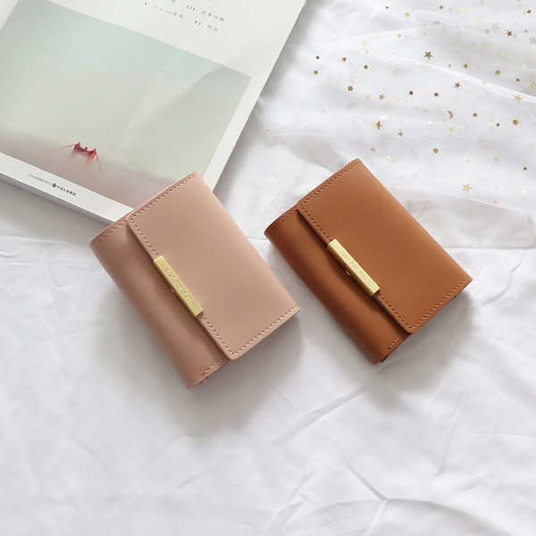 Bőr kis női pénztárca fém rögzítéssel