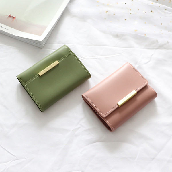 Bőr kis női pénztárca fém rögzítéssel