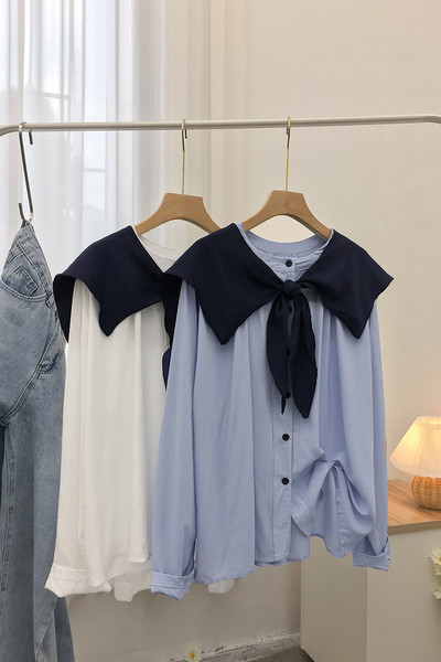 Uue mudeli ümara kaelusega ja pikkade varrukatega naiste särk